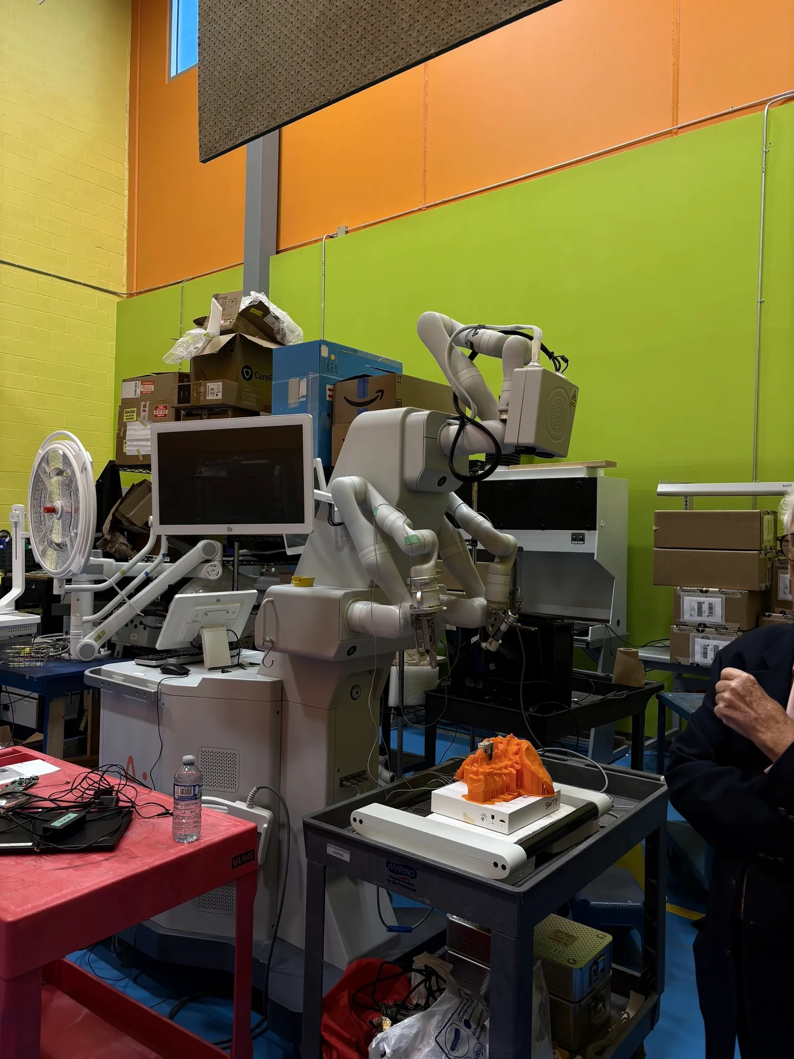 A surgical robot and an operating room light in Megalab's product safety lab